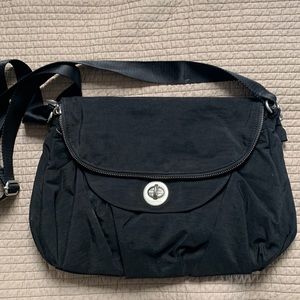 Baggallini black crossbody over the shoulder bag, lots of compartments